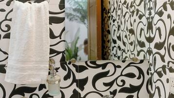 Bidet, towels, soap, toilet paper