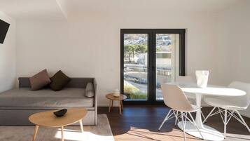 Appartamento, 1 camera da letto, vista città | Sala da pranzo