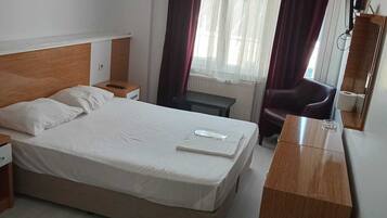 Double Room, City View | Living area | 25-inch LED TV with satellite channels