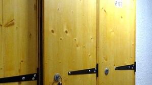A set of wooden lockers with metal latches and a key hanging on one. - Duplex 2BR for 5 - Ski-In/Ski-Out, Garage, Free Shuttle (Les Gets)