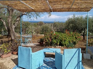 Terrace/patio - Romantic Trullo for 2  sea view pool,peaceful garden rustic  authentic Puglia (Carovigno)