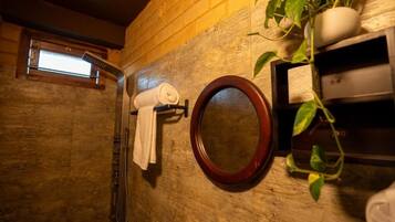 Shower, towels, soap, toilet paper