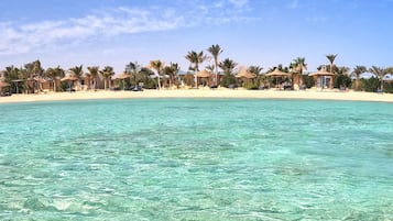 Private beach, white sand, sun loungers, beach massages