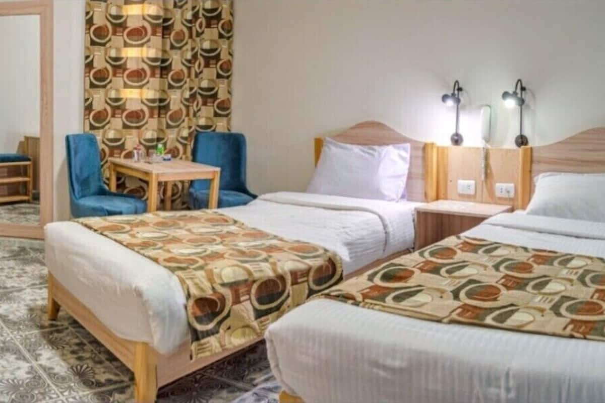Basic Twin Room, Balcony, Garden View | In-room safe, desk, laptop workspace, blackout drapes
