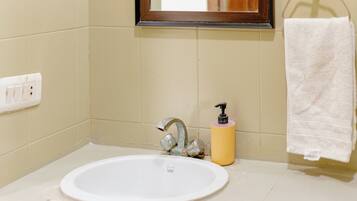 Bidet, towels, toilet paper