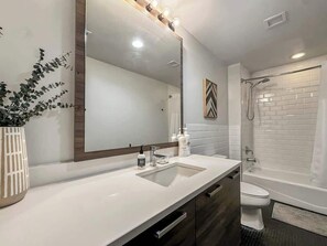 Shower, hair dryer, shampoo