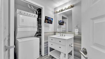 Shower, hair dryer, shampoo