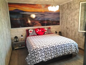 1 habitación, tabla de planchar con plancha, cuna de viaje y wifi 