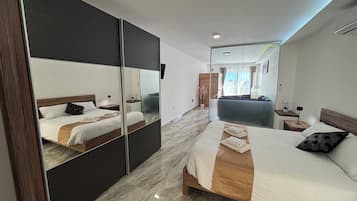 Apartamento superluxo, vista para a cidade | 1 quarto, cortinas blackout, ferros/tábuas de passar roupa