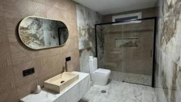 Hair dryer, bidet, towels, soap