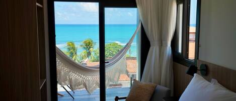 Suite Premium, vistas al mar | 1 dormitorio, caja fuerte, cortinas opacas y sistema de insonorización