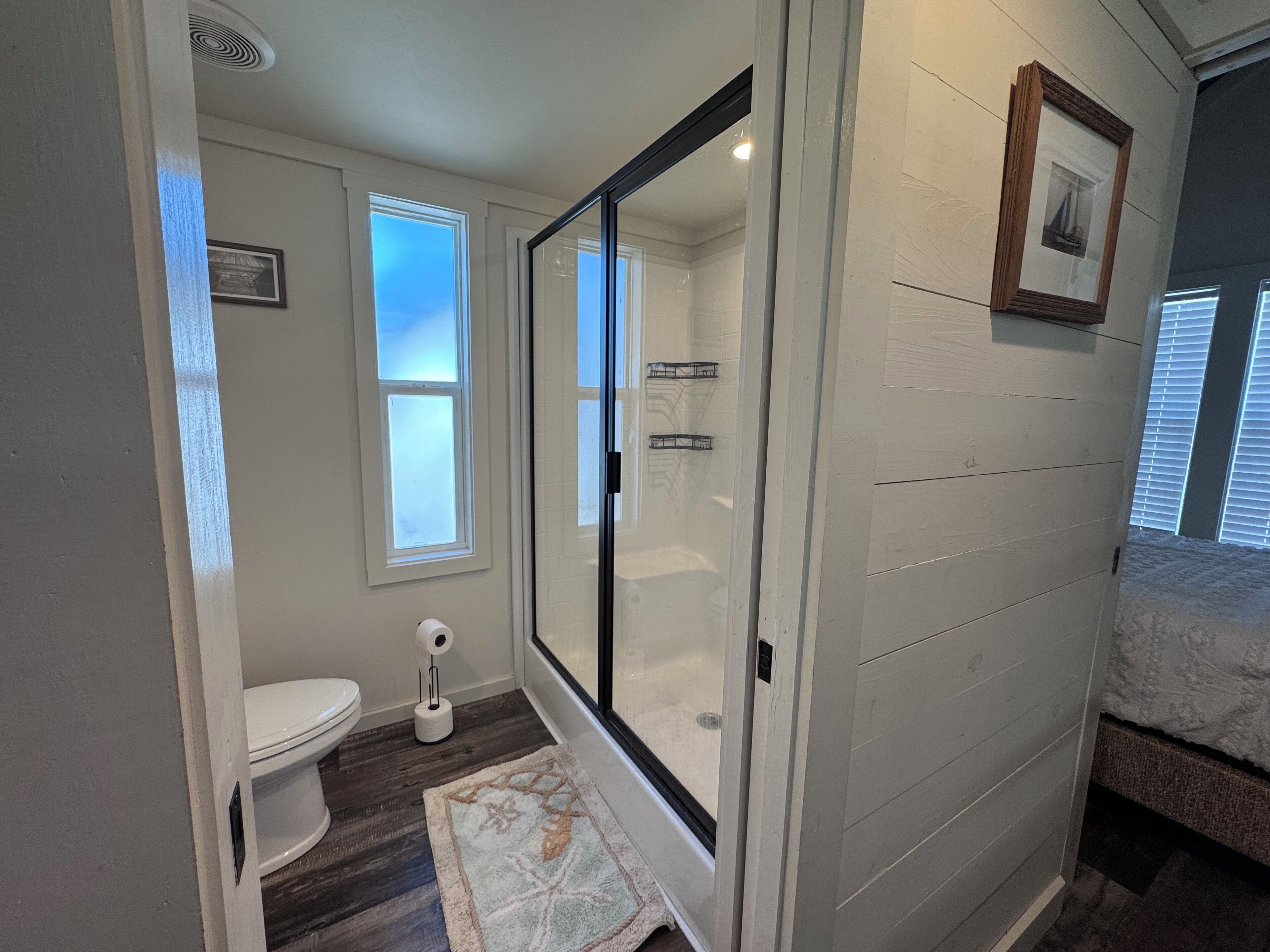 Shower, towels, soap, toilet paper
