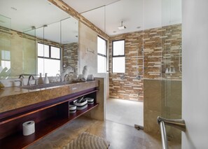 Shower, hair dryer, towels, soap