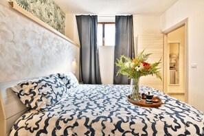 1 slaapkamer, een strijkplank/strijkijzer, gratis wifi, beddengoed