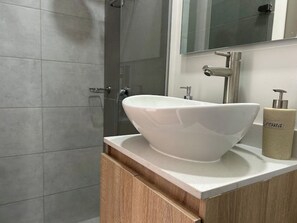 Hair dryer, towels, soap, toilet paper