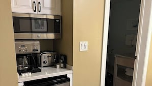 A compact kitchen with a refrigerator, microwave, toaster, and coffee maker. - Hyatt Sunset Harbor. Available Oct 19 to 26.   Studio. 3 night minimum rental.   (Key West)
