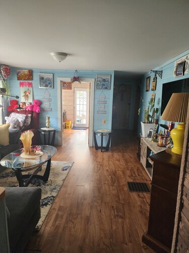 Cozy quiet house with rustic vibe.   Bedroom with private bathroom for guest use