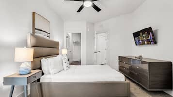 1 bedroom, desk, iron/ironing board, travel crib