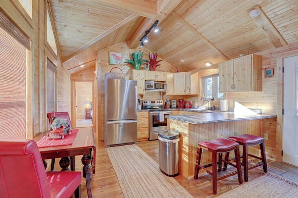 The full kitchen features all appliances and ample dining space for everyone.