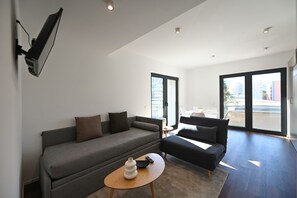 Apartment, 1 Bedroom, City View | Living room - Modern Concept Suite Crocetta 7 in Lugano (Lugano)