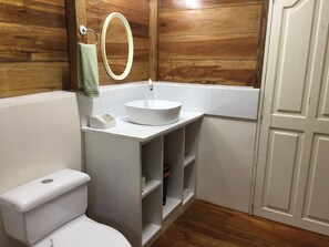 Shower, hair dryer, towels, toilet paper