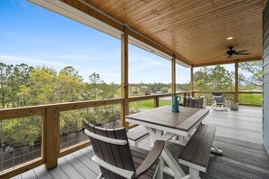 Outdoor dining - Spacious new 4-bedroom house on a deep water canal in tranquil Bay St. Louis, MS (Bay St. Louis)