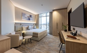 Suite Studio Deluxe, 1 trĂšs grand lit | Coffres-forts dans les chambres