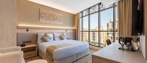 Habitación Deluxe, 1 cama King size | 1 habitación y caja de seguridad en la habitación