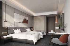 Una habitación de hotel moderna con una cama grande, mesitas de noche, un escritorio y una silla.