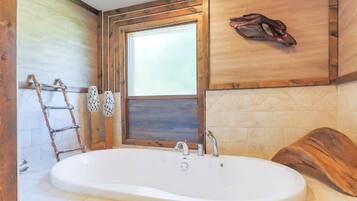 Jetted bath, hair dryer, bidet, towels