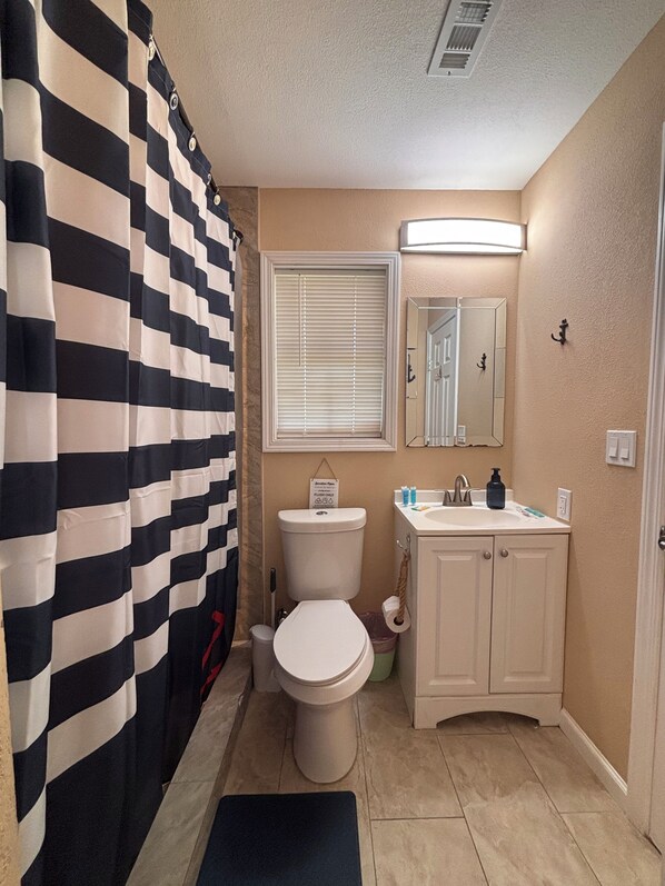 Shower, hair dryer, towels, soap - The Rustic Anchor -Relax, Recharge, Repeat- Where Comfort Meets the Lake (Burton)