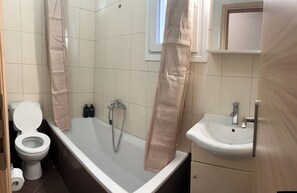 Hair dryer, towels, soap, toilet paper