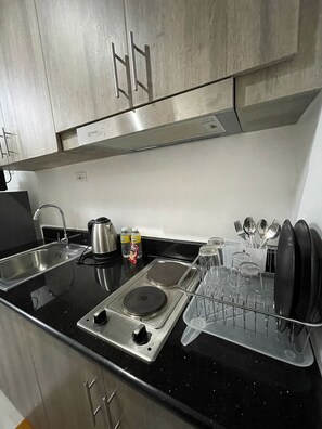 Fridge, microwave, stovetop, electric kettle