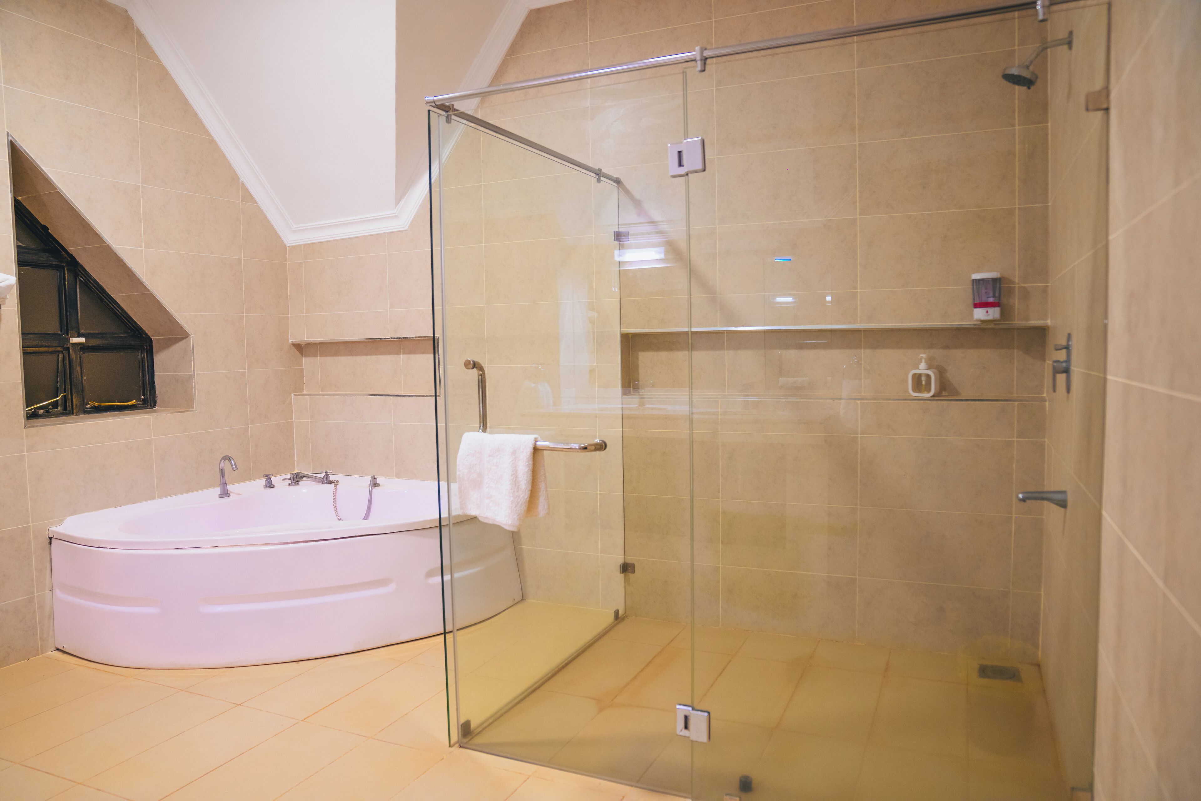 Shower, jetted bath, bidet, towels