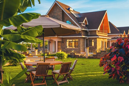 An elegant villa located in a serene Golf Resort, where luxury meets opulence.