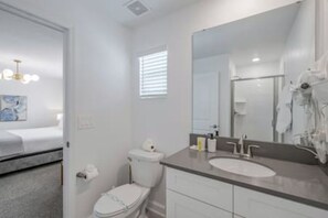 Hair dryer, towels, shampoo, toilet paper