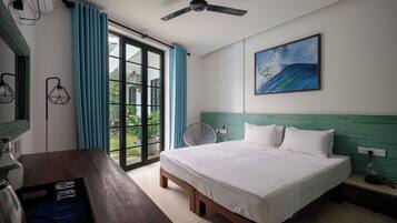 Deluxe Double or Twin Room, Pool View | In-room safe, desk, laptop workspace, free WiFi
