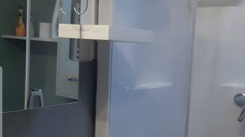 Ducha, secador de pelo