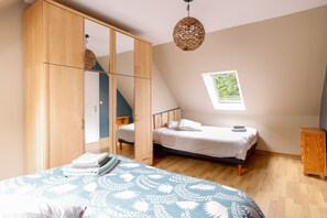 3 dormitorios, tabla de planchar con plancha, wifi gratis y ropa de cama