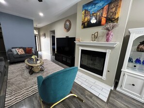 Smart TV, fireplace, table tennis, books