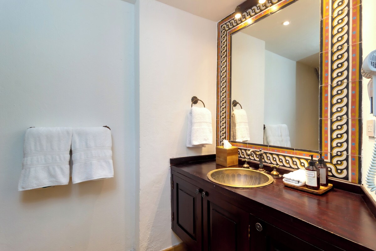 Shower, rainfall showerhead, bidet, towels