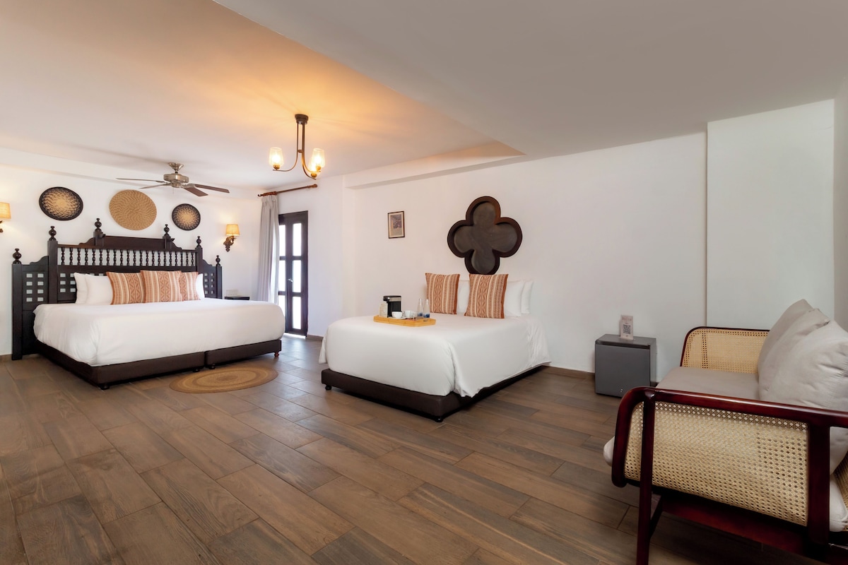 Superior Quadruple Room, Courtyard View | Minibar, in-room safe, iron/ironing board, WiFi (free)