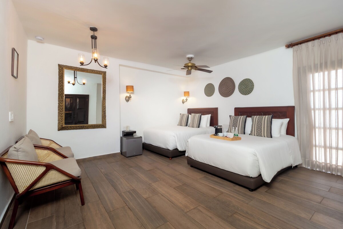 Standard Quadruple Room | Minibar, in-room safe, iron/ironing board, WiFi (free)