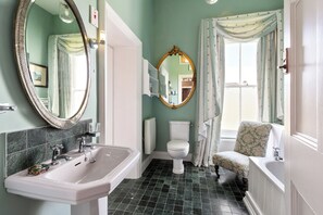 A bathroom with a sink, toilet, and bathtub. - Historic Nile Lodge House, 6 Nile Lodge, Galway City , 5 bedrooms, sleeps 10 (Galway)