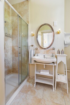Shower, hair dryer, towels, soap