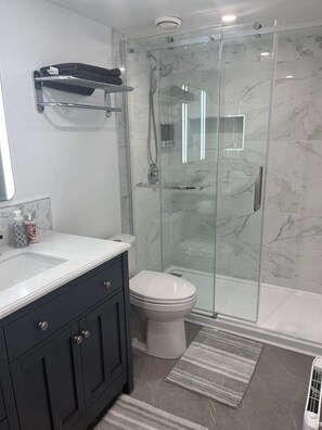 Hair dryer, towels, soap, shampoo