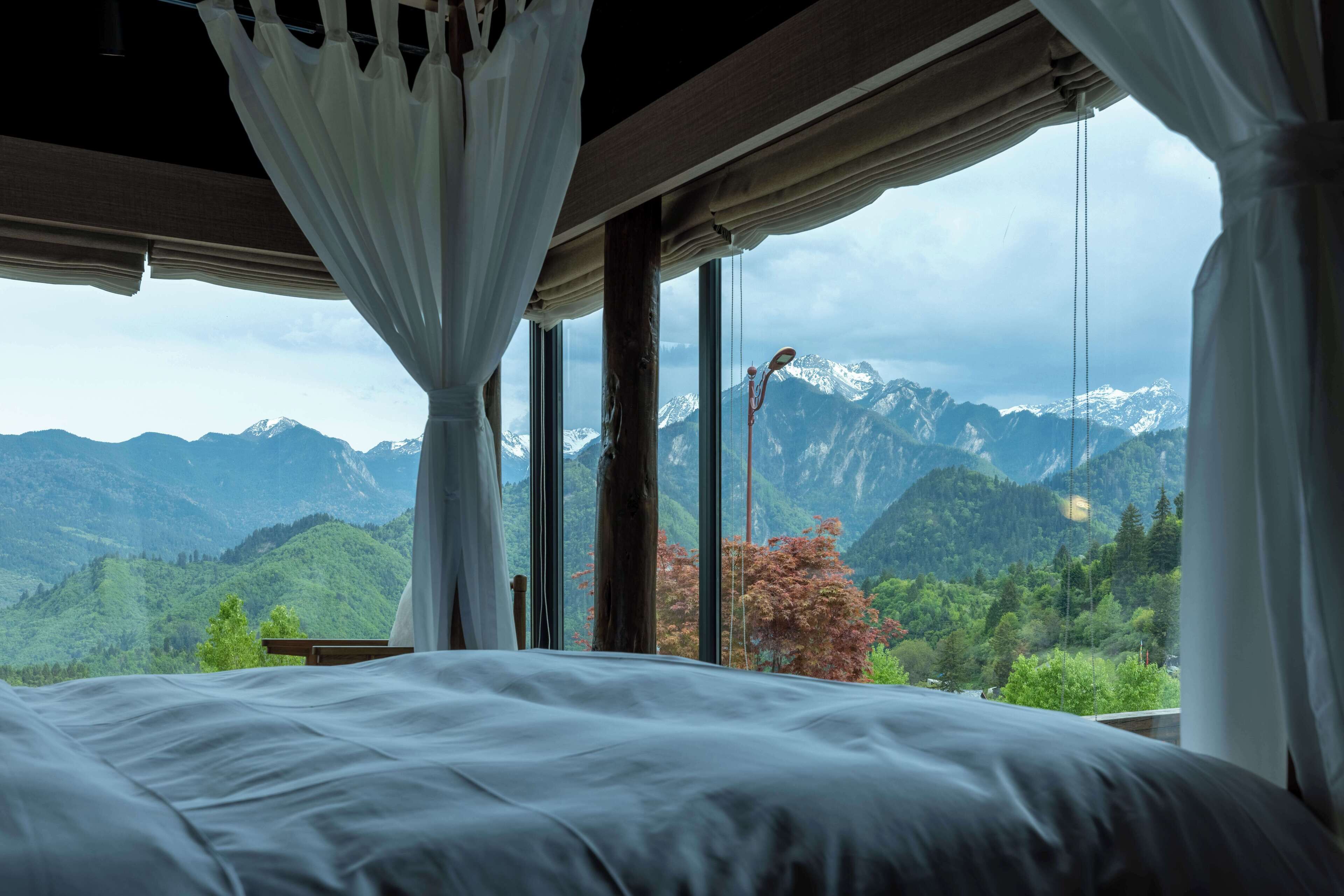 Panoramic Suite, Patio, Mountain View | Desk, laptop workspace, blackout drapes, soundproofing