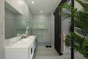 Een douche, een haardroger, handdoeken, zeep