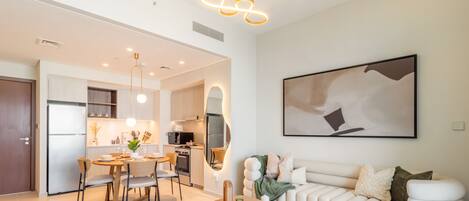 Luxury Apartment, Balcony, City View | Living area | Flat-screen TV