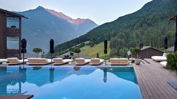 Indoor pool, outdoor pool, pool umbrellas, sun loungers